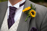 groom with sunflower buttonhole