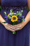 bridesmaid with sunflower bouquet