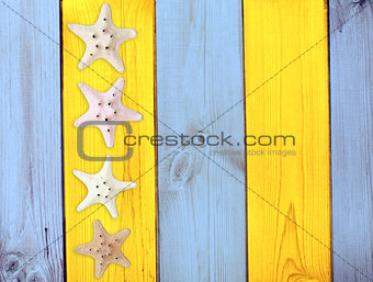 Starfishes on wood texture