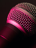 Vocal microphone in pink light