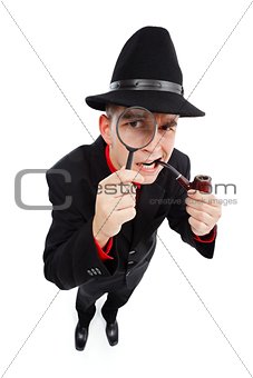 Curious detective looking through magnifier