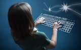 Girl typing on virtual keyboard