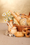 Various baked products in wicker basket