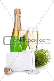 Champagne bottle, glasses and empty card