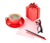 Coffee cup, red gift box and office supplies