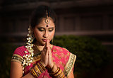 Young Indian girl praying