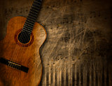 Acoustic Guitar on Grunge Background