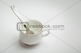 White cup and spoon