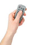 Hand with Tiny infra-red remote control unit