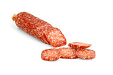 Half of salami sausage and some slices near