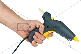 Hand holding glue gun