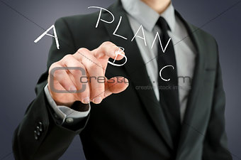 Male hand choosing plan B on a virtual screen