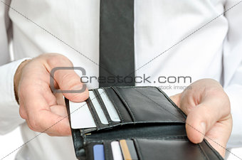 Man paying with credit cards