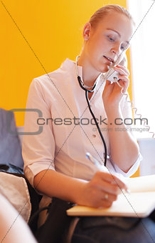 Nurse is speaking on the phone