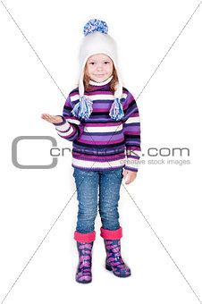 Little girl in winter clothes with empty hand