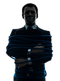 business man tied up prisoner silhouette