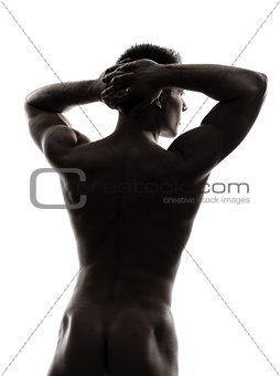 rear view back handsome naked muscular man silhouette