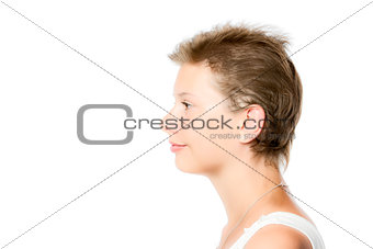 Profile view of a young pretty girl, isolated on white backgroun