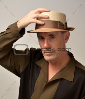 Man in Hat Going Out
