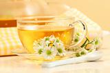Glass tea cup with herbal tea