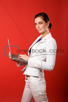 Female with Computer on Red