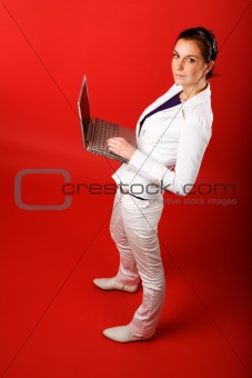 Female with Computer on Red
