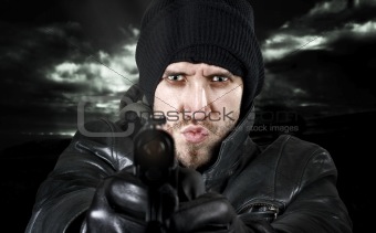 Undercover agent firing gun in the camera