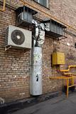 air conditioner on the brick wall with airshaft 