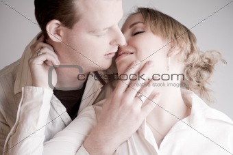Portrait of a young kissing couple