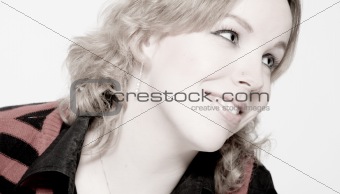 Portrait of a dreamy blond curly woman