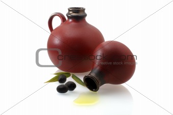 two old jugs with olive oil 