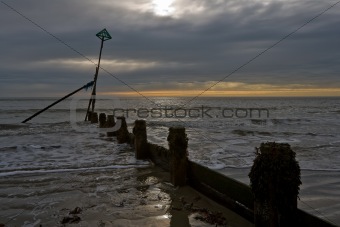 Breakwater construction in seascape at Selsey, Sussex, England