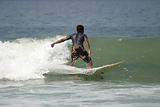 Young Man Surfing