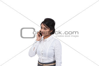 Sad businessman talking on mobile phone
