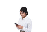 Asian businesswoman text messaging