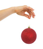 Closeup on hand holding christmas ball