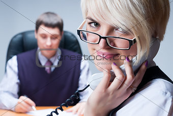 businesswoman busy taking phone