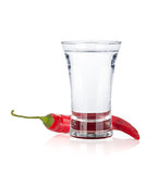Shot of vodka and red hot chili pepper