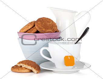 Cookies bowl, tea cup and milk jug