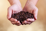Handful of fresh roasted coffee