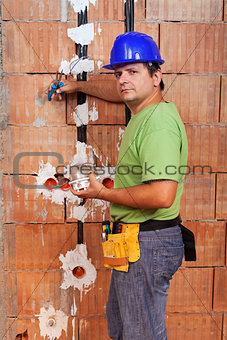 Electrician working inside new building