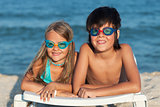 Kids with swimming goggles on the beach