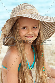 Little girl on the beach portrait