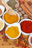 colorful spices on wooden table