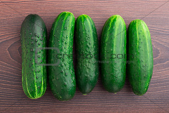 Cucumbers on wooden table