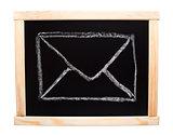 Mail symbol drawn on blackboard