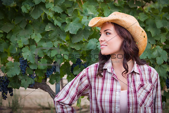 Young Adult Female Portrait Wearing Cowboy Hat in Vineyard