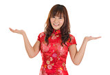 Chinese cheongsam woman showing blank space