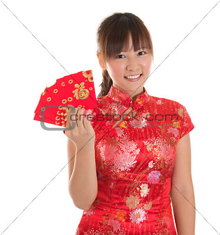 Chinese cheongsam girl showing red packets
