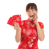 Surprise Chinese cheongsam girl holding red packets